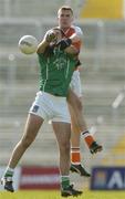 4 April 2004; Philip Longhran of Armagh in action against John Galvin of Limerick during the Allianz Football League Division 1B Round 7 match between Limerick and Armagh at the Gaelic Grounds in Limerick. Photo by David Maher/Sportsfile