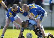 4 April 2004; Stephen O'Shaughnessy of Dublin in action against Padraic Davis, left, and Niall Sheridan of Longford during the Allianz Football League Division 1A Round 7 match between Dublin and Longford at Parnell Park in Dublin. Photo by Pat Murphy/Sportsfile