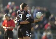 4 April 2004; Sligo players Sean Davey, 9, and Gary Maye celebrate at the final whistle of the Allianz Football League Division 1B Round 7 match between Sligo and Meath at Markievicz Park in Sligo. Photo by Ray McManus/Sportsfile