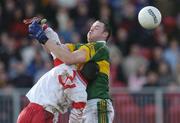 4 April 2004; Michael Quirke of Kerry in action against Ciaran Gourley of Tyrone during the Allianz Football League Division 1A Round 7 match between Tyrone and Kerry at Healy Park in Omagh, Tyrone. Photo by Brendan Moran/Sportsfile