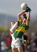 4 April 2004; Paul Galvin of Kerry in action against Colin Holmes of Tyrone during the Allianz Football League Division 1A Round 7 match between Tyrone and Kerry at Healy Park in Omagh, Tyrone. Photo by Brendan Moran/Sportsfile