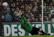 5 April 2004; Bohemians goalkeeper Matt Gregg fails to stop the penalty of Jason Byrne of Shelbourn during the Eircom League Premier Division match between Bohemians and Shelbourne at Dalymount Park in Dublin. Photo by David Maher/Sportsfile