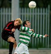 6 April 2004; Paul Keegan of Longford Town in action against Terry Palmer of Shamrock Rovers during the Eircom League Premier Division match between Shamrock Rovers and Longford Town at Richmond Park in Dublin. Photo by David Maher/Sportsfile