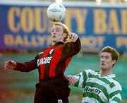 6 April 2004; Paul Keegan of Longford Town in action against Jason McGuinness of Shamrock Rovers during the Eircom League Premier Division match between Shamrock Rovers and Longford Town at Richmond Park in Dublin. Photo by David Maher/Sportsfile