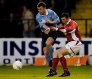 9 April 2004; Dom Tierney of Dublin City in action against Jason Byrne of Shelbourne during the Eircom League Premier Division match between Shelbourne and Dublin City at Tolka Park in Dublin. Photo by David Maher/Sportsfile
