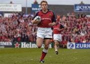 10 April 2004; Shaun Payne of Munster on his way to scoring his side's first try during the Heineken Cup Quarter-Final match between Munster and Stade Francais at Thomond Park in Limerick. Photo by Ray McManus/Sportsfile