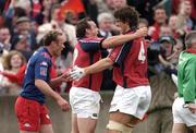 10 April 2004; Rob Henderson, left, of Munster celebrates scoring his side's second try with team-mate Donnacha O'Callaghan during the Heineken Cup Quarter-Final match between Munster and Stade Francais at Thomond Park in Limerick. Photo by Ray McManus/Sportsfile