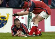 10 April 2004; Marcus Horan of Munster is congratulated by team-mate Anthony Foley after scoring his side's fourth try during the Heineken Cup Quarter-Final match between Munster and Stade Francais at Thomond Park in Limerick. Photo by Brendan Moran/Sportsfile
