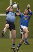 10 April 2004; Graham Cullen of Dublin in action against Michael Kelly of Longford during the Leinster U-21 Football Championship Semi-Final match between Dublin and Longford at Pairc Tailieann in Navan, Meath. Photo by Damien Eagers/Sportsfile