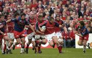 10 April 2004; Marcus Horan of Munster breaks through the Stade Francais defence during the Heineken Cup Quarter-Final match between Munster and Stade Francais at Thomond Park in Limerick. Photo by Brendan Moran/Sportsfile