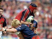 10 April 2004; Anthony Foley of Munster in action against Patrick Tabacco of Stade Francais during the Heineken Cup Quarter-Final match between Munster and Stade Francais at Thomond Park in Limerick. Photo by Brendan Moran/Sportsfile