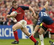 10 April 2004; Marcus Horan of Munster in action against Thomas Lombard of Stade Francais during the Heineken Cup Quarter-Final match between Munster and Stade Francais at Thomond Park in Limerick. Photo by Brendan Moran/Sportsfile
