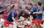 10 April 2004; Paul O'Connell of Munster is tackled by Brian Liebenberg of Stade Francais during the Heineken Cup Quarter-Final match between Munster and Stade Francais at Thomond Park in Limerick. Photo by Ray McManus/Sportsfile