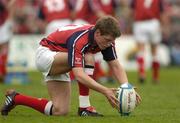 10 April 2004; Ronan O'Gara of Munster, with strapping on his injured ankle, prepares to take a penalty during the Heineken Cup Quarter-Final match between Munster and Stade Francais at Thomond Park in Limerick. Photo by Brendan Moran/Sportsfile