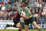 11 April 2004; Matt Mostyn of Connacht is tackled by George Harder of NEC Harlequins during the Parker Pen Challenge Cup Semi-Final between NEC Harlequins and Connacht at Twickenham Stoop Stadium in London, England. Photo by Pat Murphy/Sportsfile
