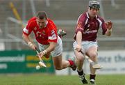 11 April 2004; Diarmuid O'Sullivan of Cork in action against Eugene Cloonan of Galway during the Allianz Hurling League Division 1 Group 1 match between Galway and Cork at Pearse Stadium in Galway. Photo by David Maher/Sportsfile