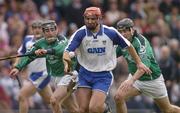 11 April 2004; Seamus Prendergast of Waterford in action against Michael Cahill, left, and TJ Ryan of Limerick during the Allianz Hurling League Division 1 Group 1 match between Waterford and Limerick at Walsh Park in Waterford. Photo by Matt Browne/Sportsfile