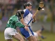 11 April 2004; Paul Flynn of Waterford is tackled by Michael Cahill of Limerick during the Allianz Hurling League Division 1 Group 1 match between Waterford and Limerick at Walsh Park in Waterford. Photo by Matt Browne/Sportsfile