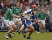 11 April 2004; Seamus Prendergast of Waterford is tackled by TJ Ryan of Limerick during the Allianz Hurling League Division 1 Group 1 match between Waterford and Limerick at Walsh Park in Waterford. Photo by Matt Browne/Sportsfile