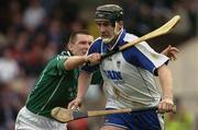 11 April 2004; Andy Moloney of Waterford is tackled by Mark Foley of Limerick during the Allianz Hurling League Division 1 Group 1 match between Waterford and Limerick at Walsh Park in Waterford. Photo by Matt Browne/Sportsfile