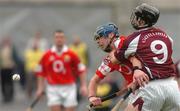11 April 2004; Ronan Curran of Cork is tackled by Tony Og Regan of Galway during the Allianz Hurling League Division 1 Group 1 match between Galway and Cork at Pearse Stadium in Galway. Photo by David Maher/Sportsfile