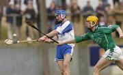11 April 2004; Michael Walsh of Waterford in action against Niall Moran of Limerick during the Allianz Hurling League Division 1 Group 1 match between Waterford and Limerick at Walsh Park in Waterford. Photo by Matt Browne/Sportsfile
