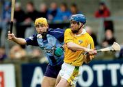 11 April 2004; Michael McCambridge of Antrim in action against David Curtin of Dublin during the Allianz Hurling League Division 1 Group 2 match between Dublin and Antrim at Parnell Park in Dublin. Photo by Brian Lawless/Sportsfile