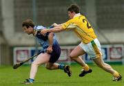 11 April 2004; Tommy Moore of Dublin in action against Liam Richmond of Antrim during the Allianz Hurling League Division 1 Group 2 match between Dublin and Antrim at Parnell Park in Dublin. Photo by Brian Lawless/Sportsfile