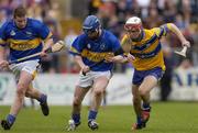 11 April 2004; Gerry Quinn of Clare in action against Paddy O'Brien, right, and John Carroll of Tipperary during the Allianz Hurling League Division 1 Group 1 match between Clare and Tipperary at Cusack Park in Ennis, Clare. Photo by Ray McManus/Sportsfile