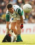 14 July 2007; Mark Little, Fermanagh, tries to get a dog off the field. Bank of Ireland All-Ireland Football Championship Qualifier, Round 2, Meath v Fermanagh, Pairc Tailteann, Navan. Photo by Sportsfile