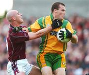 14 July 2007; Neil McGee, Donegal, in action against Martin Flanagan, Westmeath. Bank of Ireland All-Ireland Football Championship Qualifier, Round 2, Westmeath v Donegal, Cusack Park, Mullingar, Co. Westmeath. Picture credit: Ray McManus / SPORTSFILE