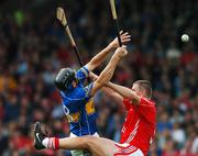 14 July 2007; Michael Webster, Tipperary, contests a dropping ball against Diarmuid O'Sullivan, Cork. Guinness All-Ireland Hurling Championship Qualifier, Group B, Tipperary v Cork, Semple Stadium, Thurles, Co. Tipperary. Picture credit: Brendan Moran / SPORTSFILE