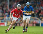 14 July 2007; Benny Dunne, Tipperary, in action against Ronan Curran, Cork. Guinness All-Ireland Hurling Championship Qualifier, Group B, Tipperary v Cork, Semple Stadium, Thurles, Co. Tipperary. Picture credit: Brendan Moran / SPORTSFILE