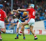 14 July 2007; Lar Corbett, Tipperary, contests a dropping ball with Ronan Curran, Cork. Guinness All-Ireland Hurling Championship Qualifier, Group B, Tipperary v Cork, Semple Stadium, Thurles, Co. Tipperary. Picture credit: Brendan Moran / SPORTSFILE