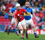 14 July 2007; Timmy McCarthy, Cork, in action against Eamonn Corcoran, Tipperary. Guinness All-Ireland Hurling Championship Qualifier, Group B, Tipperary v Cork, Semple Stadium, Thurles, Co. Tipperary. Picture credit: Brendan Moran / SPORTSFILE