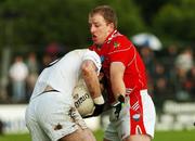14 July 2007; Kevin O'Neill, Kildare, in action against Aaron Hoey, Louth. Bank of Ireland All-Ireland Football Championship Qualifier, Round 2, Kildare v Louth, St. Conleth's Park, Newbridge, Co. Kildare. Picture credit: Maurice Doyle / SPORTSFILE