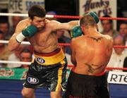 14 July 2007; John Duddy in action against Alessio Furlan during the first round. Hunky Dorys Fight Night, John Duddy.v.Alessio Furlan, National Stadium, Dublin. Picture credit: Stephen McCarthy / SPORTSFILE