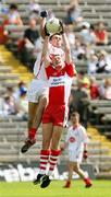 15 July 2007; Paul Heaney, Derry, in action against Kyle Coney, Tyrone. ESB Ulster Minor Football Championship Final - Derry v Tyrone, St Tighearnach's Park, Clones, Co Monaghan. Picture credit: Oliver McVeigh / SPORTSFILE