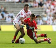 15 July 2007; Christopher McKaigue, Derry, in action against Kyle Coney, Tyrone. ESB Ulster Minor Football Championship Final - Derry v Tyrone, St Tighearnach's Park, Clones, Co Monaghan. Picture credit: Oliver McVeigh / SPORTSFILE