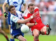 15 July 2007; Gerard Cavlan, Tyrone, in action against Dessie Mone, Monaghan. Bank of Ireland Ulster Senior Football Championship Final - Tyrone v Monaghan, St Tighearnach's Park, Clones, Co Monaghan. Picture credit: Russell Pritchard / SPORTSFILE