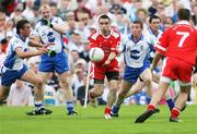 15 July 2007; Ryan McMenamin, Tyrone, in action against Damian and Thomas Freeman, Monaghan. Bank of Ireland Ulster Senior Football Championship Final - Tyrone v Monaghan, St Tighearnach's Park, Clones, Co Monaghan. Picture credit: Oliver McVeigh / SPORTSFILE