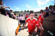15 July 2007; Tyrone's Ryan McMenamin and team-mate Gerard Cavian make their way to the changing room. Bank of Ireland Ulster Senior Football Championship Final - Tyrone v Monaghan, St Tighearnach's Park, Clones, Co Monaghan. Picture credit: Russell Pritchard / SPORTSFILE