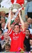 15 July 2007; Tyrone's Brian Dooher with the Anglo-Celt Cup. Bank of Ireland Ulster Senior Football Championship Final - Tyrone v Monaghan, St Tighearnach's Park, Clones, Co Monaghan. Picture credit: Russell Pritchard / SPORTSFILE