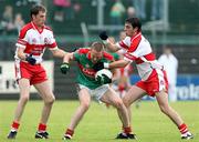 14 July 2007; David Heaney, Mayo, in action against Enda Muldoon and Liam Hinphey, Derry. Bank of Ireland All-Ireland Football Championship Qualifier, Round 2, Derry v Mayo, Celtic Park, Derry. Picture credit: Oliver McVeigh / SPORTSFILE