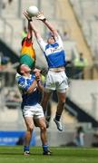 15 July 2007; Donal Kingston, Laois, contests a dropping ball with Daniel St Ledger, Carlow, and team-mate John O'Loughlin. ESB Leinster Minor Football Championship Final, Laois v Carlow, Croke Park, Dublin. Picture credit: Brendan Moran / SPORTSFILE