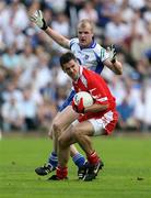15 July 2007; Philip Jordan, Tyrone, in action against Dick Clerkin, Monaghan. Bank of Ireland Ulster Senior Football Championship Final - Tyrone v Monaghan, St Tighearnach's Park, Clones, Co Monaghan. Picture credit: Oliver McVeigh / SPORTSFILE