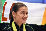 25 November 2014; Team Ireland's Katie Taylor pictured in Dublin Airport on her return from the 2014 AIBA Elite Women's World Boxing Championships in Jeju, Korea. Dublin Airport, Dublin. Picture credit: Barry Cregg / SPORTSFILE