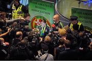 25 November 2014; Team Ireland's Katie Taylor, with her coach and father Pete Taylor, speaks to the media in Dublin Airport on her return from the 2014 AIBA Elite Women's World Boxing Championships in Jeju, Korea. Dublin Airport, Dublin. Picture credit: Cody Glenn / SPORTSFILE