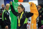 25 November 2014; Team Ireland's Katie Taylor pictured with her gold medal in Dublin Airport on her return from the 2014 AIBA Elite Women's World Boxing Championships in Jeju, Korea. Dublin Airport, Dublin. Picture credit: Cody Glenn / SPORTSFILE