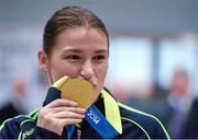 25 November 2014; Team Ireland's Katie Taylor pictured in Dublin Airport on her return from the 2014 AIBA Elite Women's World Boxing Championships in Jeju, Korea. Dublin Airport, Dublin Picture credit: Barry Cregg / SPORTSFILE